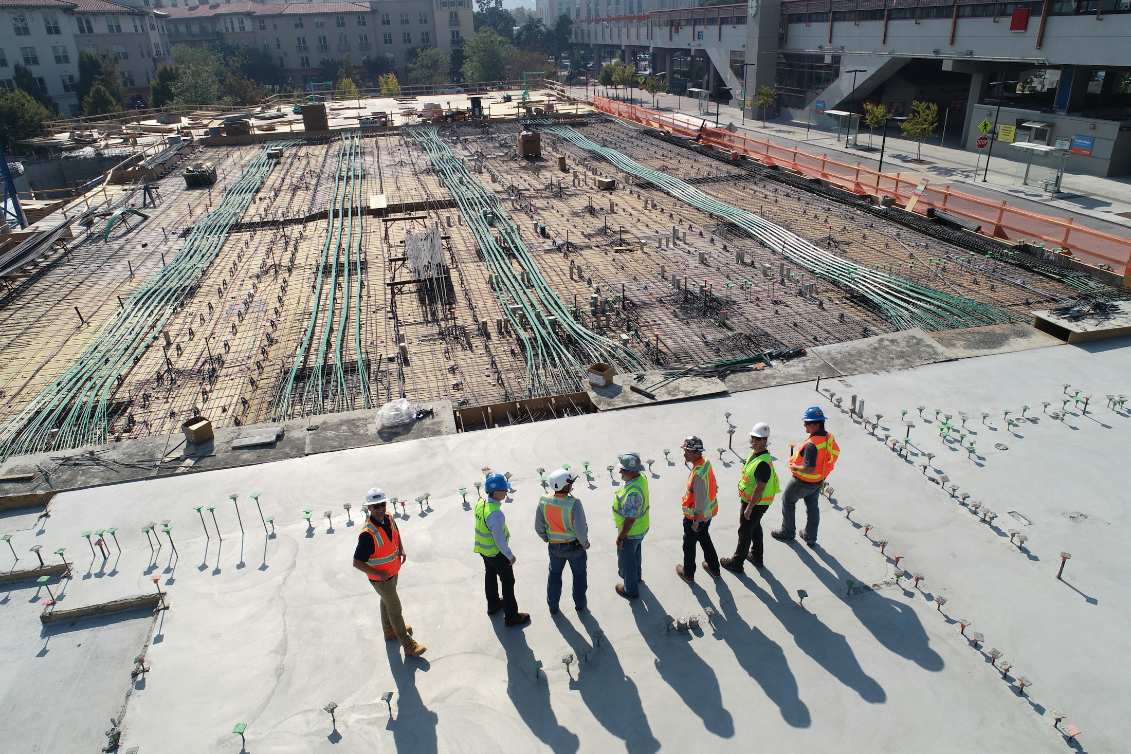 Construction workers reviewing a project site